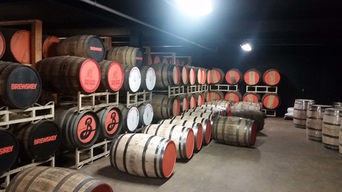 Barrels inside the distillery barrel room - Copper & Kings American Brandy Co.